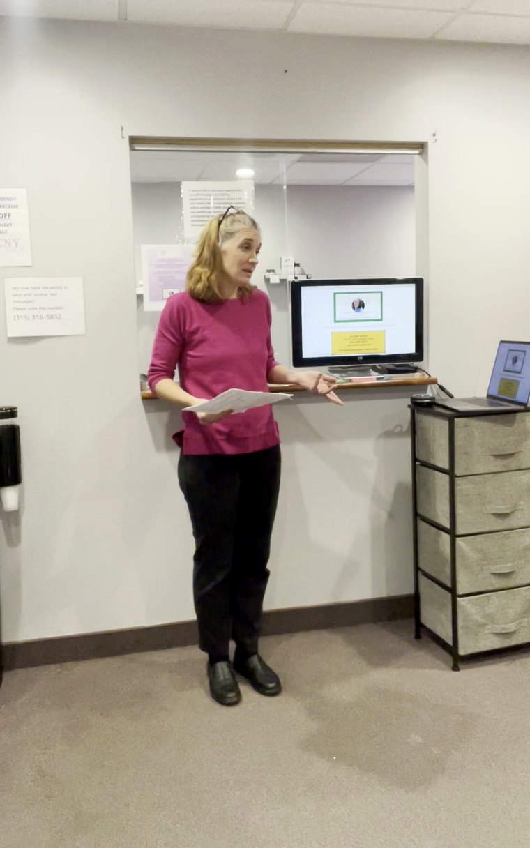 Jennifer Brown addressing the room during a wellness talk